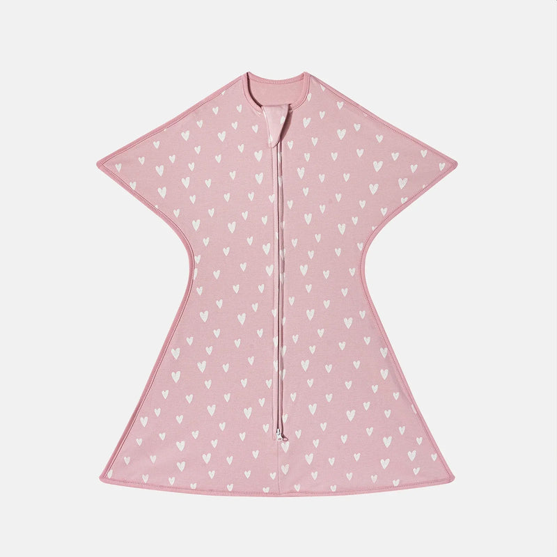 Light pink lightweight baby sleep sack featuring white heart patterns, perfect for cozy sleep.