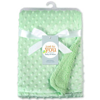 Mint green dotted fleece baby blanket with white ribbon and tag reading just you, 100x70 cm, for ages 0-6 years.