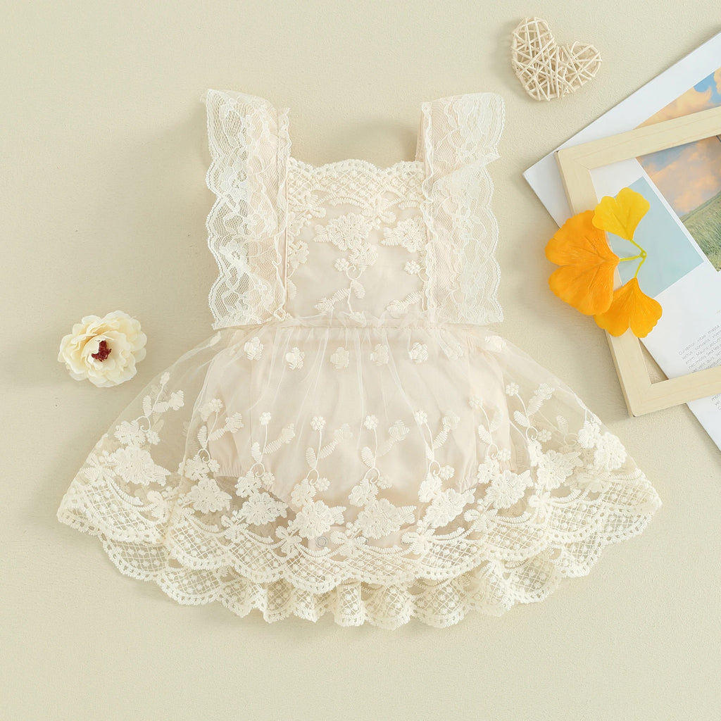 Collette Lace Romper Dress showcasing intricate lace detailing and flattering ruffled straps, perfect for baby girls aged newborn to 24 months.