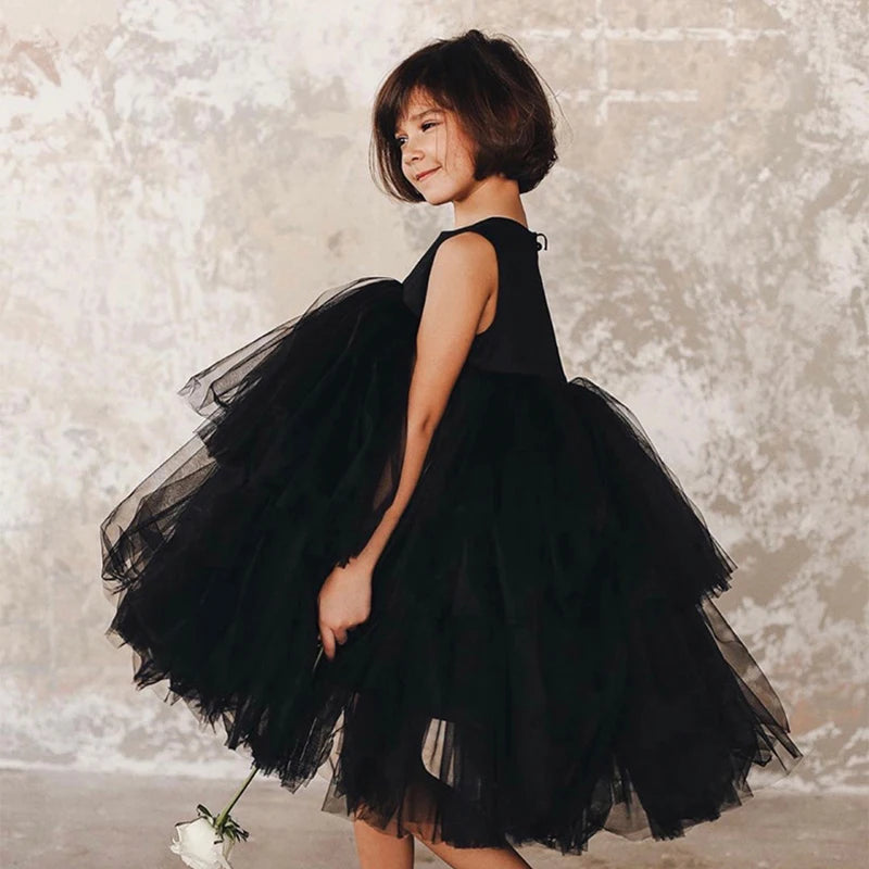 Cara Ann girls tiered tulle party dress in Black, empire waist, round neckline, mid-calf length.