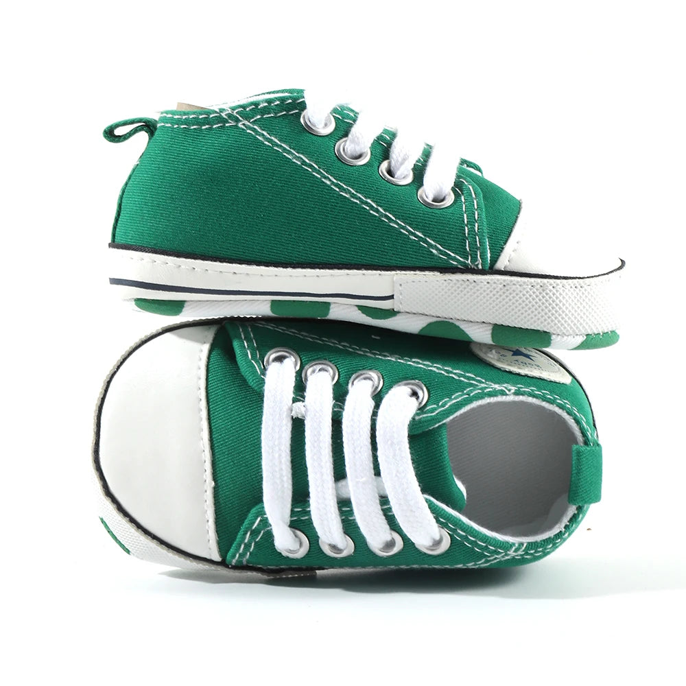 Baby's Canvas Lace-up First Walkers in Royal Palm Green, perfect for baby's first steps, featuring breathable canvas upper and cork sole support for comfort and style.
