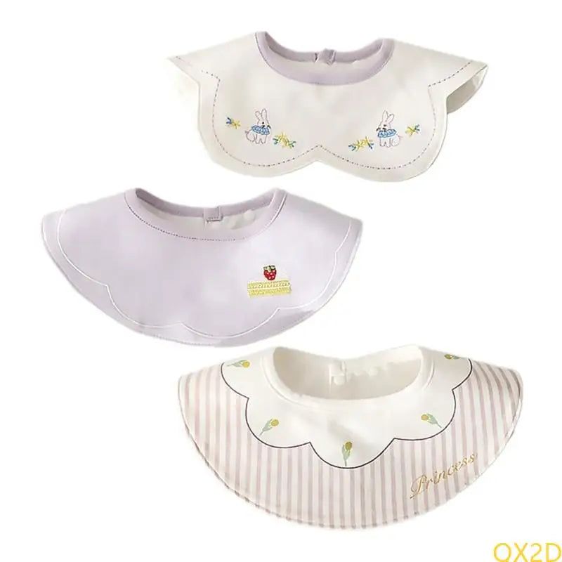 Three-piece waterproof baby bibs set with cotton embroidery and snap closures, pastel design sets.