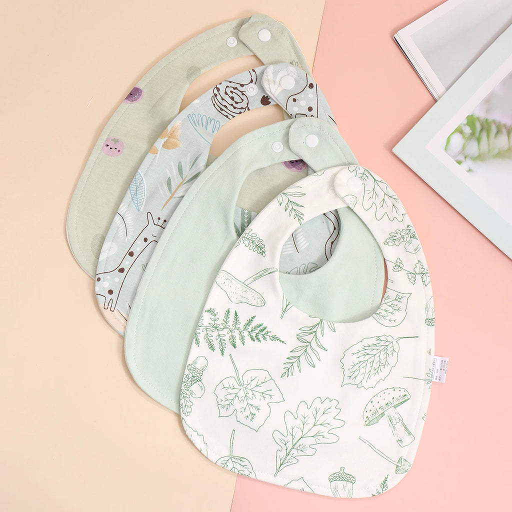 4 PC Soft Cotton Bib Set - Adjustable Bib Sets for Babies featuring adorable green and floral patterns, highlighting the softness and comfort of the soft cotton bib set.