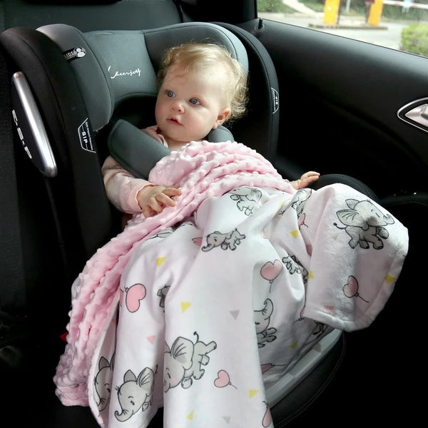 Ellie Elephant Pink 30x40 baby blanket with plush pink polka dots on one side and elephant motif on the other.