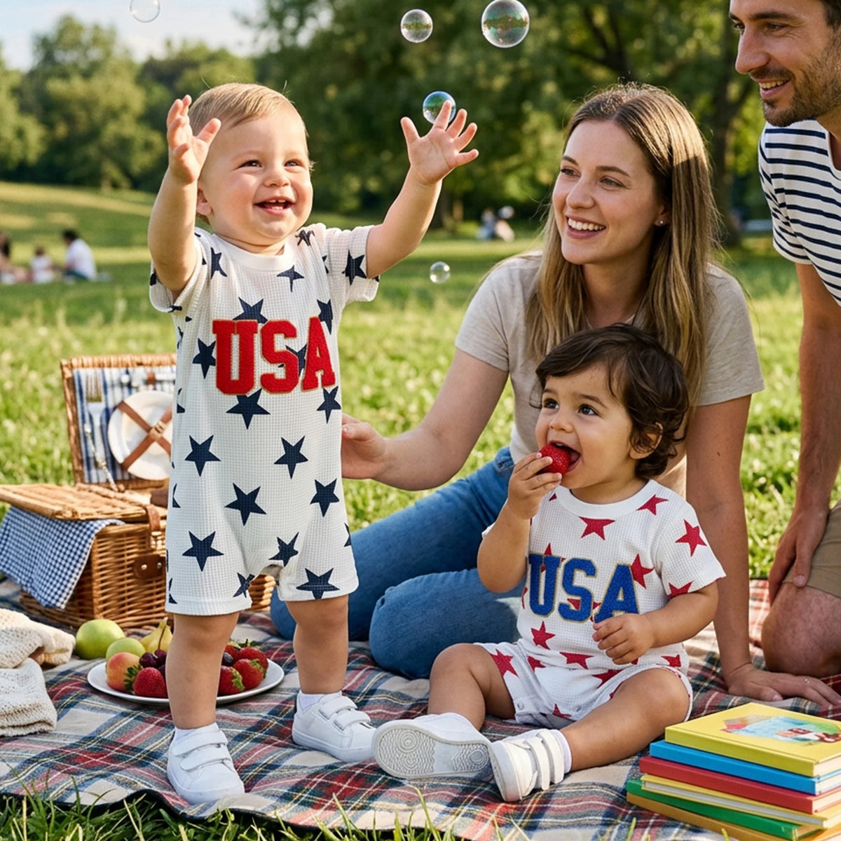 Freddie USA Embroidered Patriotic Romper for Toddlers showcasing vibrant red, white, and blue colors. Perfect patriotic romper for toddlers with playful USA embroidery.