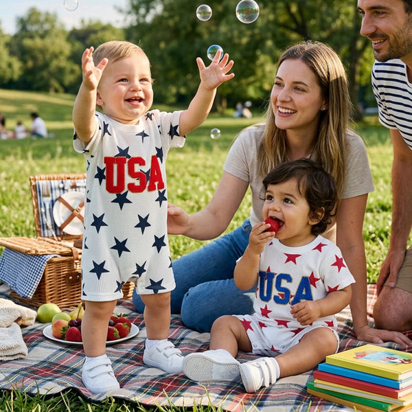 Freddie USA Embroidered Patriotic Romper for Toddlers showcasing vibrant red, white, and blue colors. Perfect patriotic romper for toddlers with playful USA embroidery.