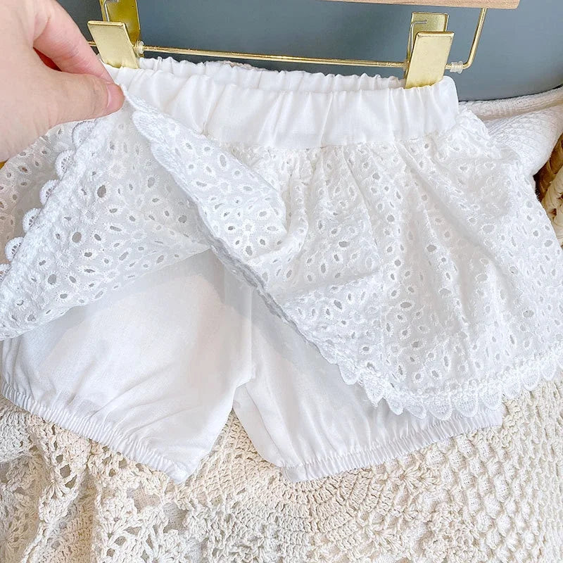 White lace two-piece skort and top set for little girls with elastic waist and back buttons.