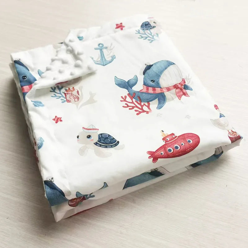 Whale and turtle print minky blanket, 100x75cm. Soft baby gift with nautical design, perfect for toddlers and sensitive skin.