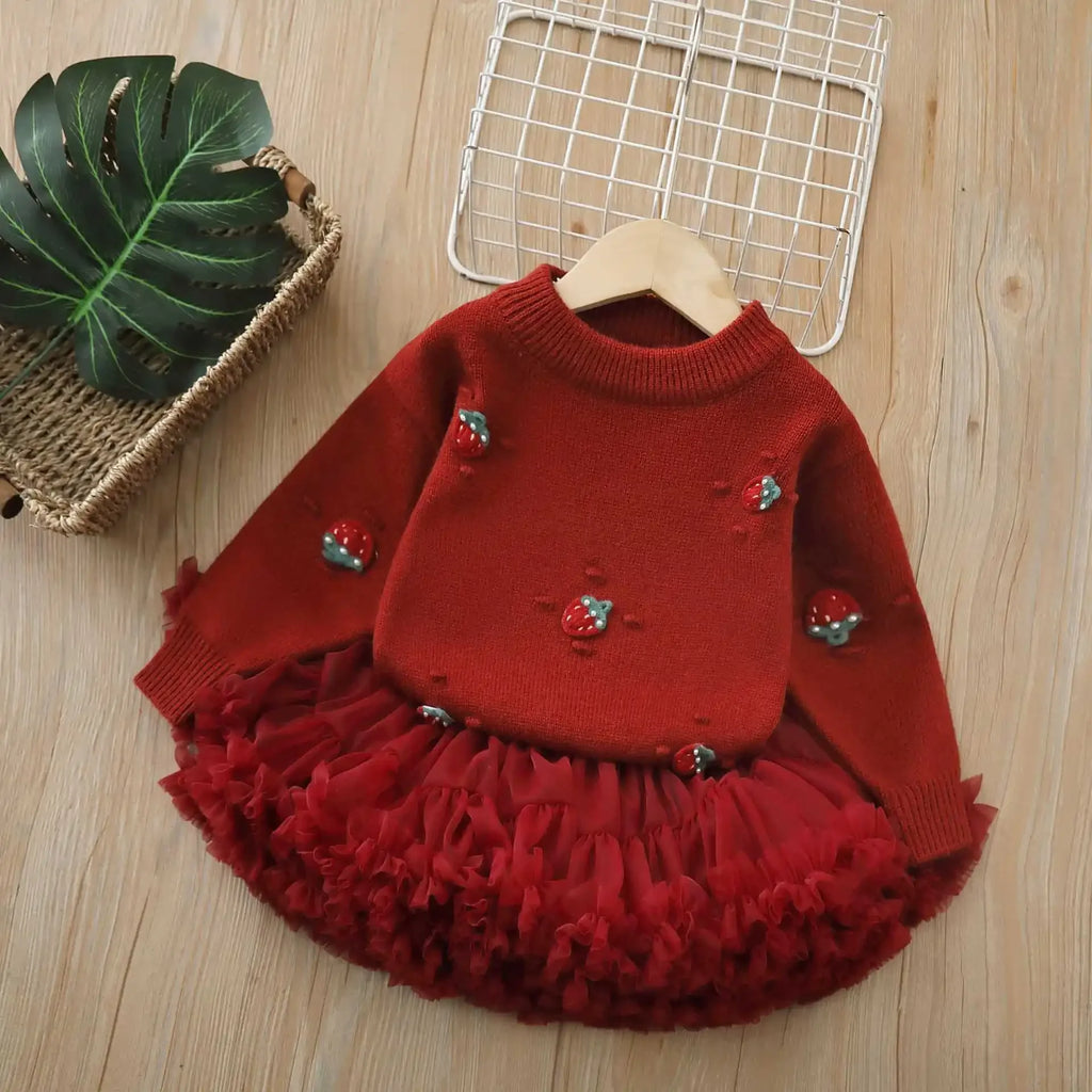 Strawberry Girls Knit Sweater and Tulle Skirt - Deep Red, showing the front view of the warm knit pullover with 3-D strawberry embroidery and a flouncy tulle skirt.