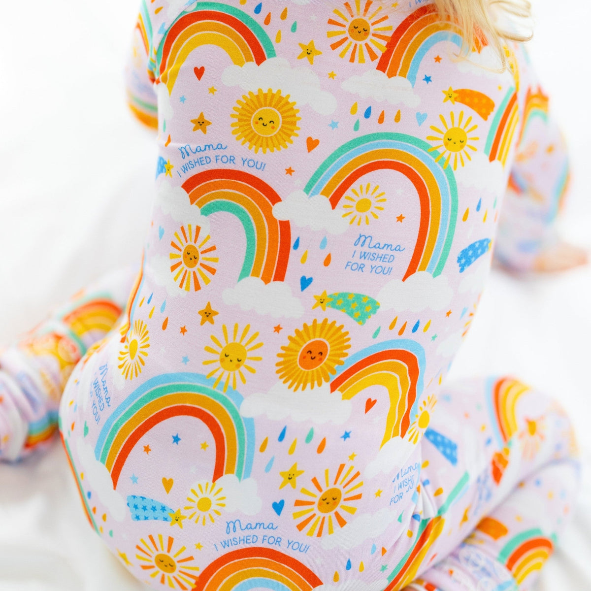 Happy toddler wearing The Second-Skin Convertible Romper for Toddlers | Here Comes the Sunshine, perfect for active play and naps, designed as a convertible romper for toddlers.