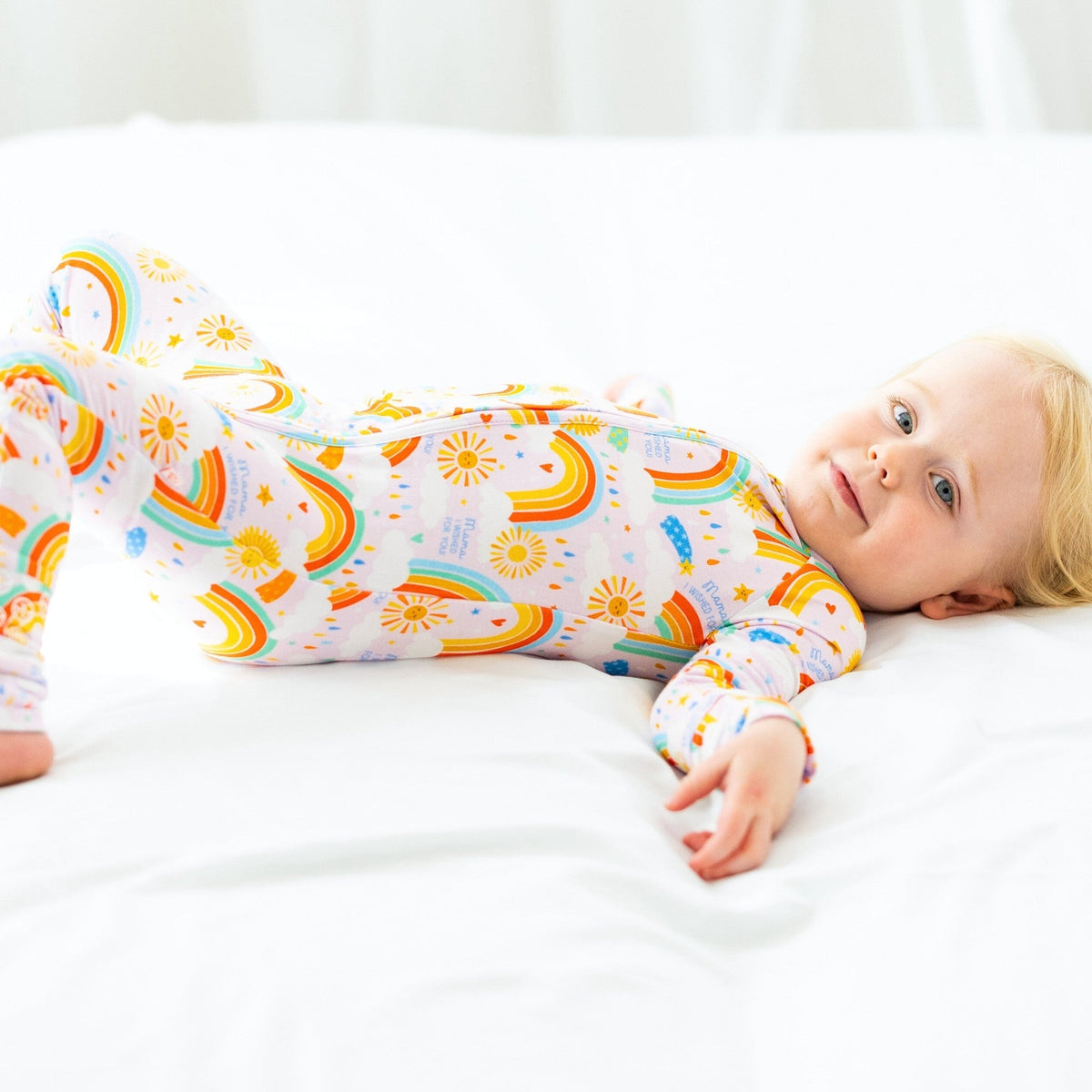 Versatile styling of The Second-Skin Convertible Romper for Toddlers | Here Comes the Sunshine, showing how it transitions from pajamas to playwear as a convertible romper for toddlers.