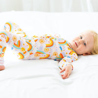 Versatile styling of The Second-Skin Convertible Romper for Toddlers | Here Comes the Sunshine, showing how it transitions from pajamas to playwear as a convertible romper for toddlers.