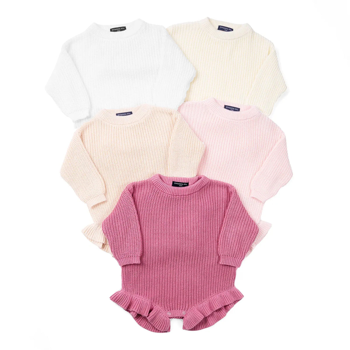 Five SwaddleAn knit rompers in assorted colors displayed flat to show ribbed collars and ruffles