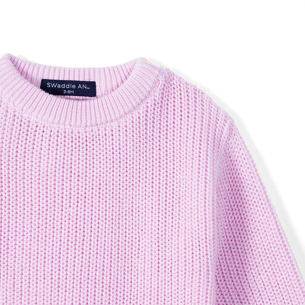 Close-up of lilac knit texture and navy SWaddle AN size label inside collar
