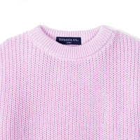 Crew neck detail of lilac romper with ribbed stitching and visible size tag