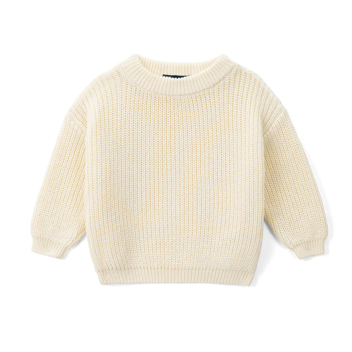 Cream chunky knit crewneck baby sweater flat lay with ribbed cuffs and dark brand tag on white background