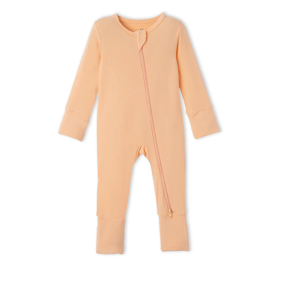 Peach bamboo convertible footie pajamas flat-lay with full zipper and fold-over ankle cuffs