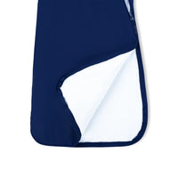 Reinforced stitching and white inner lining at hem of navy sleep sack