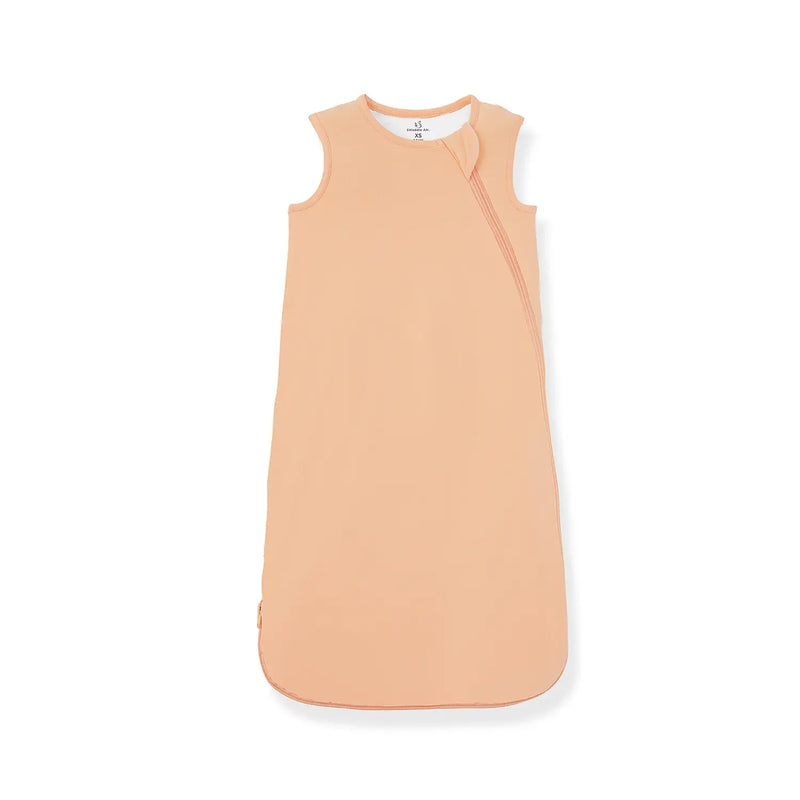 Peach fuzz bamboo sleep sack with diagonal zipper on white background