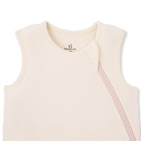 Black swan logo and brand name inside collar of sand bamboo sleep sack
