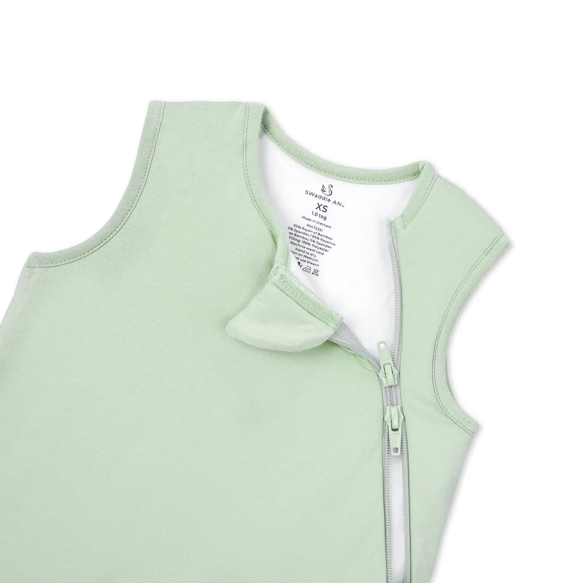 Close up of neck label showing Swaddle AN XS 1.0 tog next to zipper