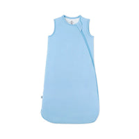 Light blue sleeveless baby sleep sack with diagonal zipper on white background