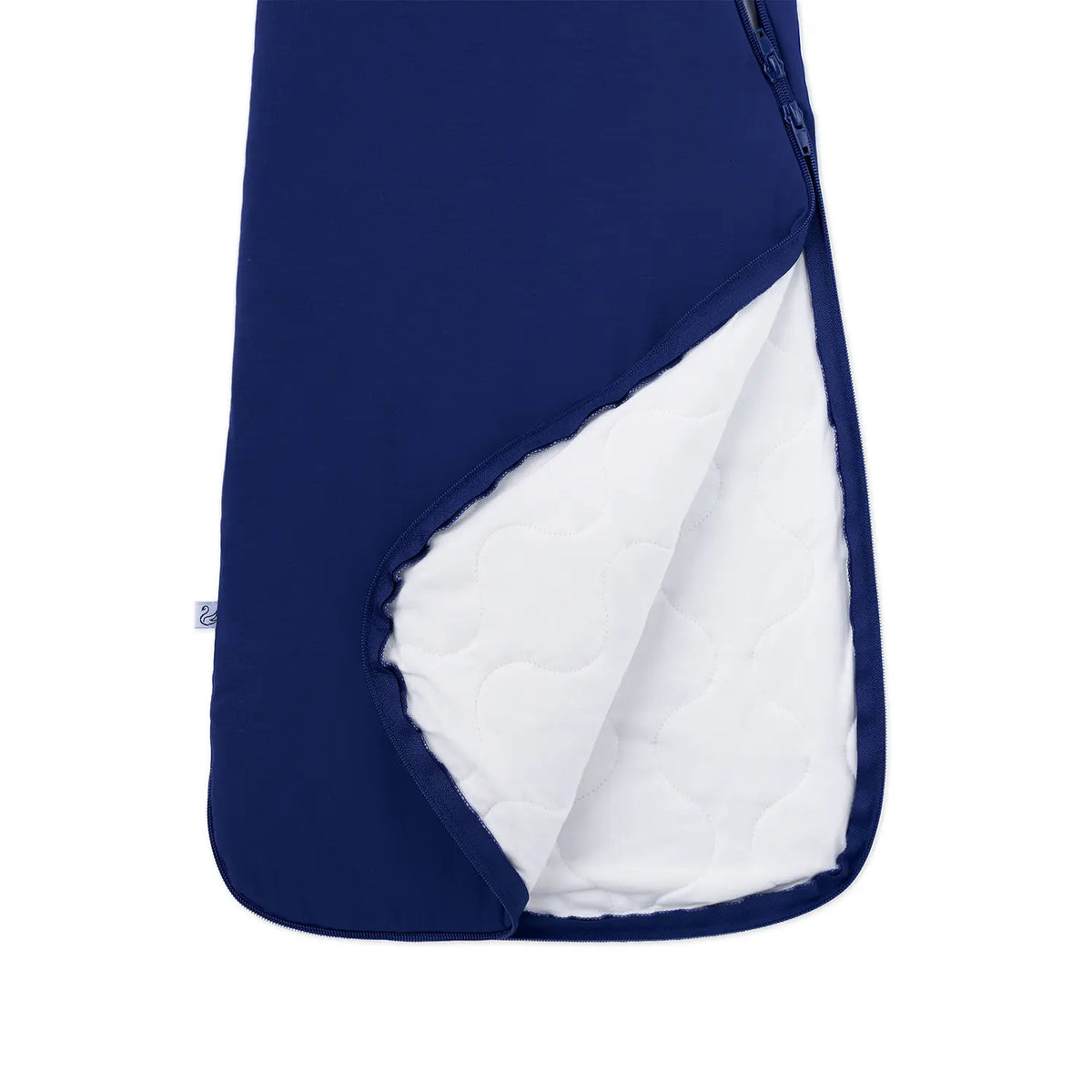 Open navy sleep sack revealing white quilted inner lining insulation