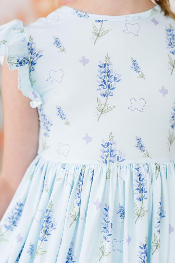 Texas bluebonnet print twirl dress for girls with flutter sleeves and gathered waist.