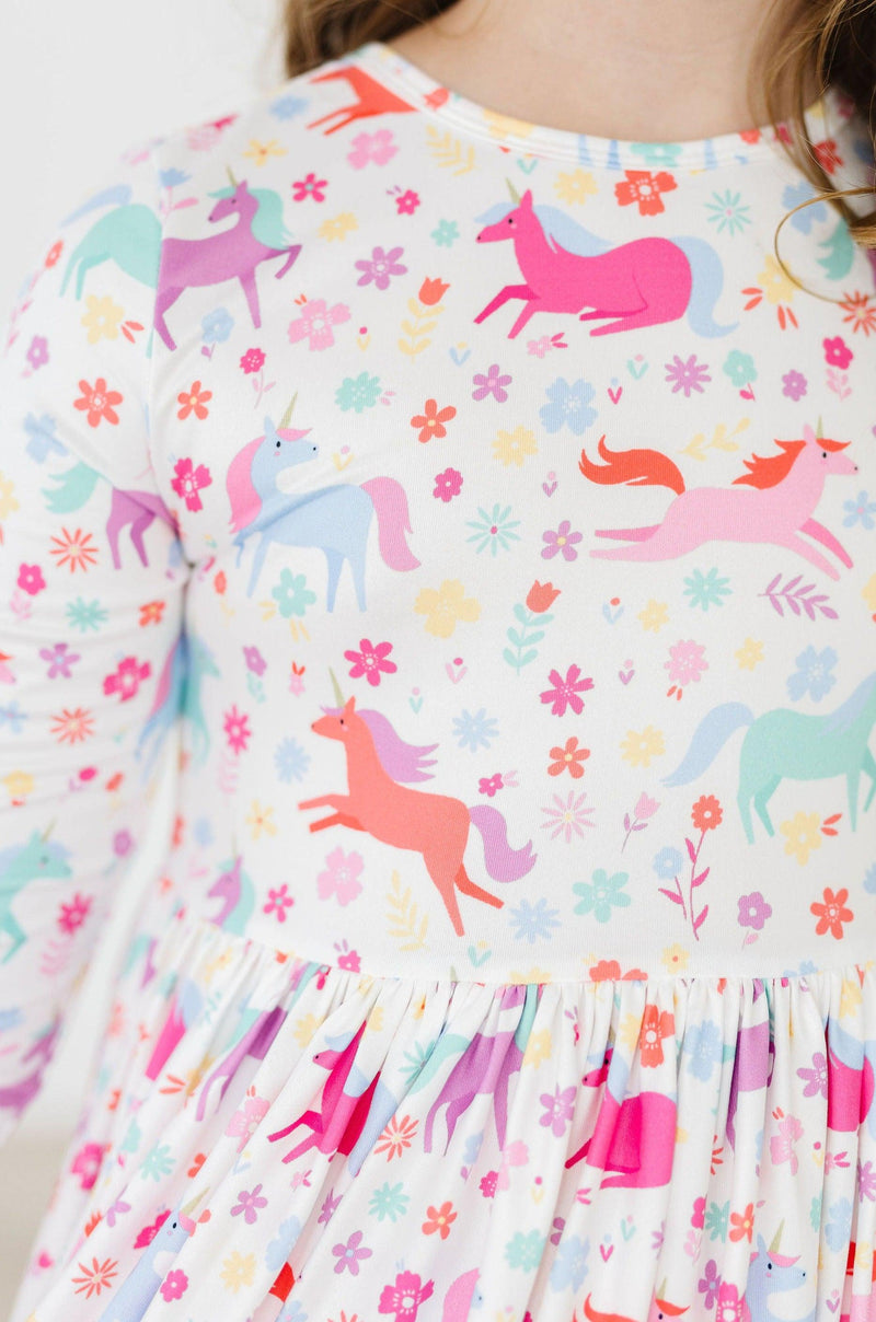 Close-up view of the Unicorn Wish 3/4 Sleeve Pocket Twirl Dress for Girls showcasing the comfortable fabric ideal for joyous twirling.