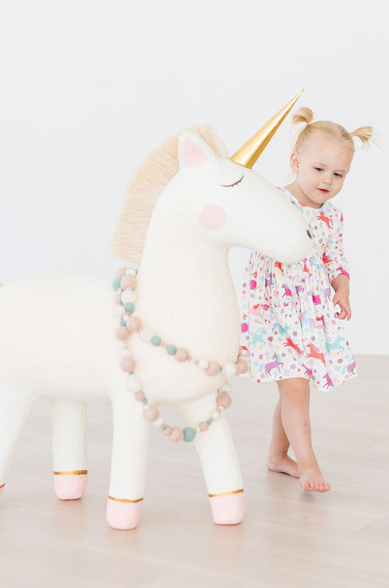 Unicorn Wish 3/4 Sleeve Pocket Twirl Dress for Girls featuring an enchanting twirl design for playful adventures.
