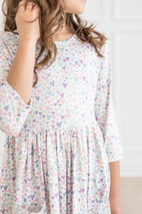 One in a Million 3/4 Sleeve Pocket Twirl Dress with pastel hearts, full twirl skirt, scoop back.