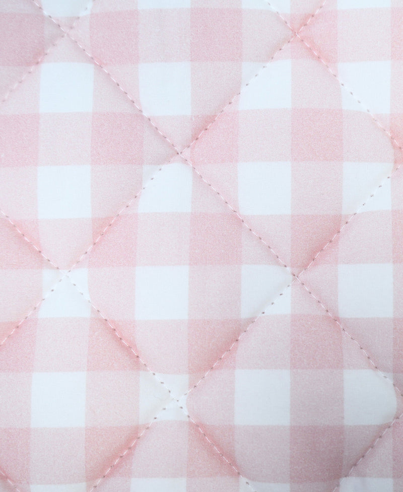 Close-up of Goosewaddle® Super Soft Play Mats showing pink and white checkered pattern, perfect for a cozy play environment.