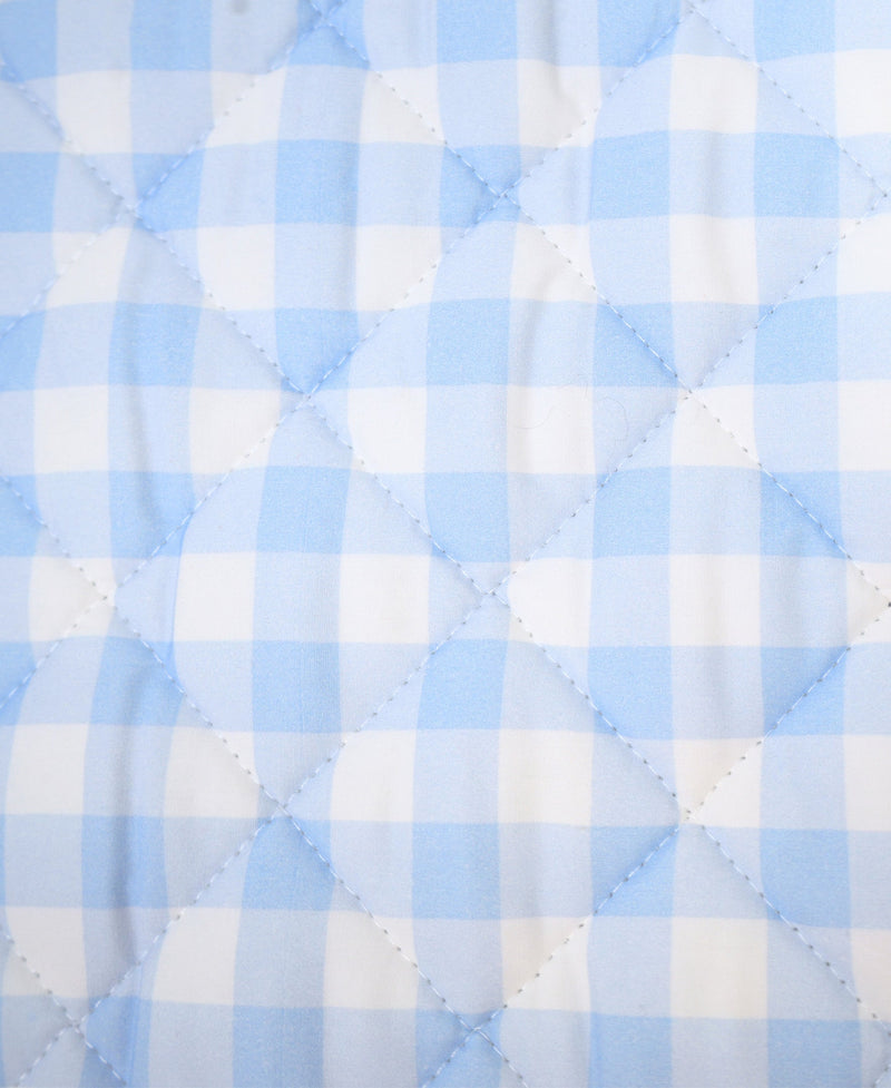 Textured close-up of Goosewaddle® Super Soft Play Mats showcasing a light blue checkered pattern for a stylish play area.