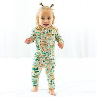 The Second-Skin Toddler Convertible Romper displayed in a playful setting, highlighting its versatile design for nap time or playtime.