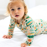 The Second-Skin Toddler Convertible Romper laid out flat, showing its durable fabric and stylish features.