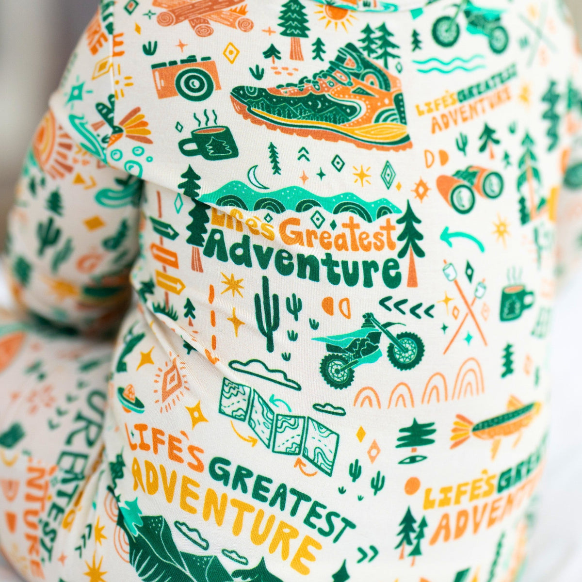Close-up view of the two-way zipper feature on the Second-Skin Toddler Convertible Romper, perfect for quick outfit changes.