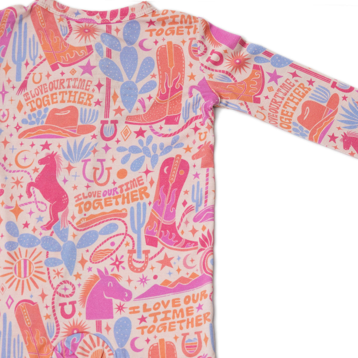 Adorable hand-drawn print on the Second-Skin Footless Romper | Saddle Up Western Themed, making this bamboo baby romper a unique addition to your baby's wardrobe.