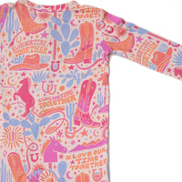 Adorable hand-drawn print on the Second-Skin Footless Romper | Saddle Up Western Themed, making this bamboo baby romper a unique addition to your baby's wardrobe.