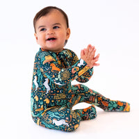 Baby wearing The Second-Skin Convertible Romper in Wild West print, buttery-soft viscose from bamboo.