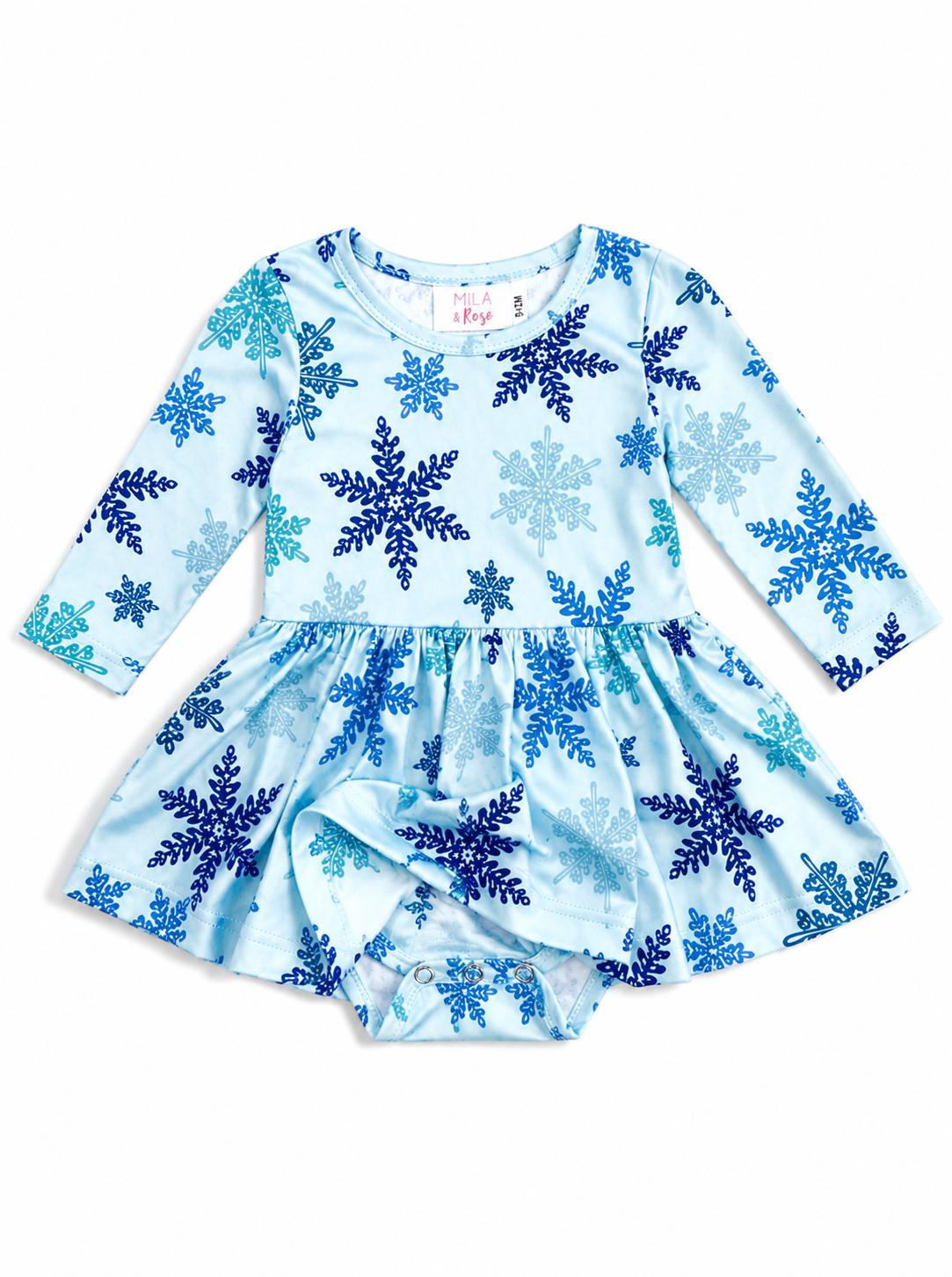 Light blue winter wonderland long sleeve twirl bodysuit with blue snowflake print and snap closure for easy diaper changes.