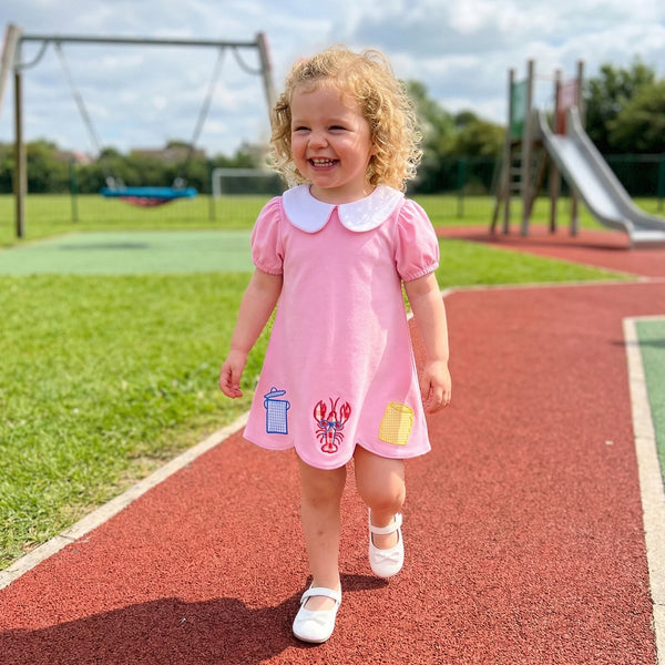 toddler girls pink a-line dress wedding style with white peter pan collar and applique details