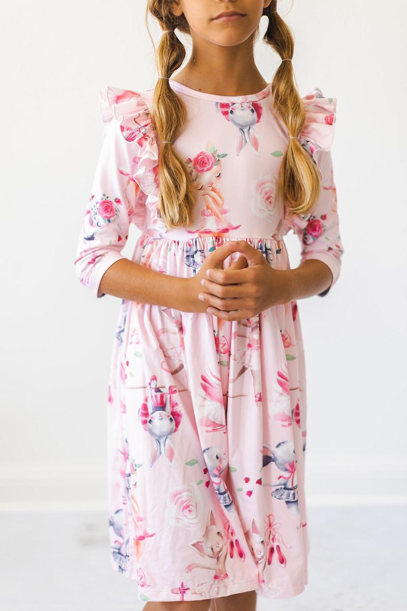 Ballet Beauties Ruffle Twirl Dress by Mila & Rose, featuring a vibrant fabric and playful ruffles, perfect for little dancers.