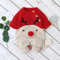 Red and beige knitted reindeer knit romper for babies with wooden buttons made of soft yarn
