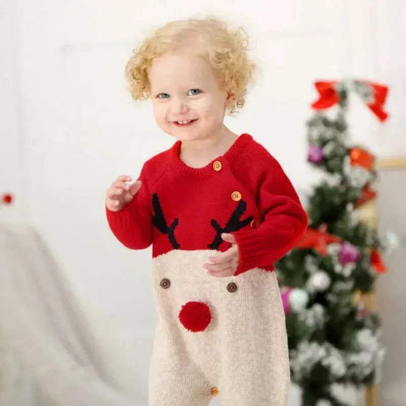 Red and cream reindeer knit romper for babies made of soft cozy material with button details
