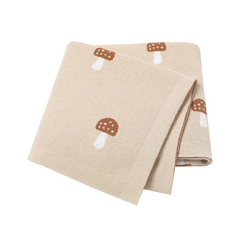 Beige animal baby blankets with brown and white mushroom pattern for infants and toddlers