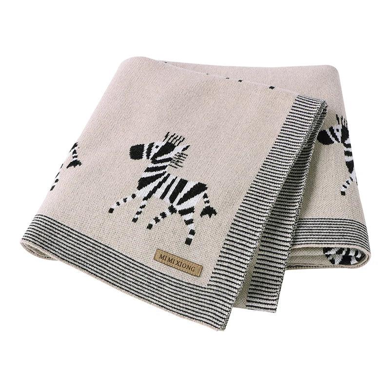 Beige and black animal baby blankets with zebra pattern, suitable for infants and toddlers, soft knit fabric