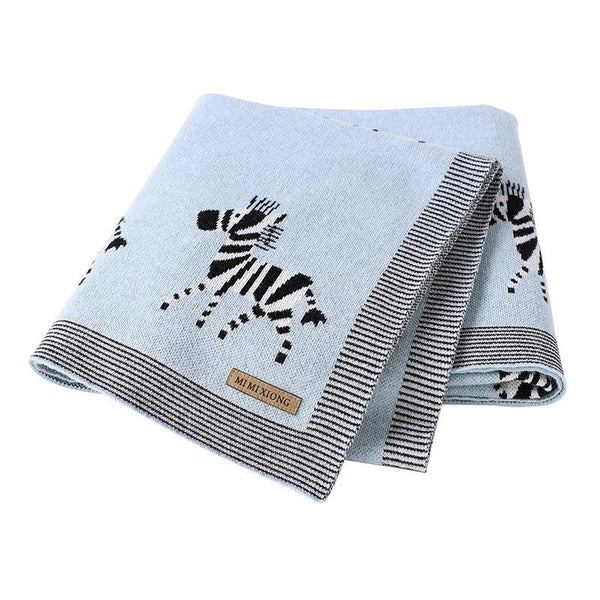 Light blue animal baby blankets for babies with black and white zebra design and striped edges