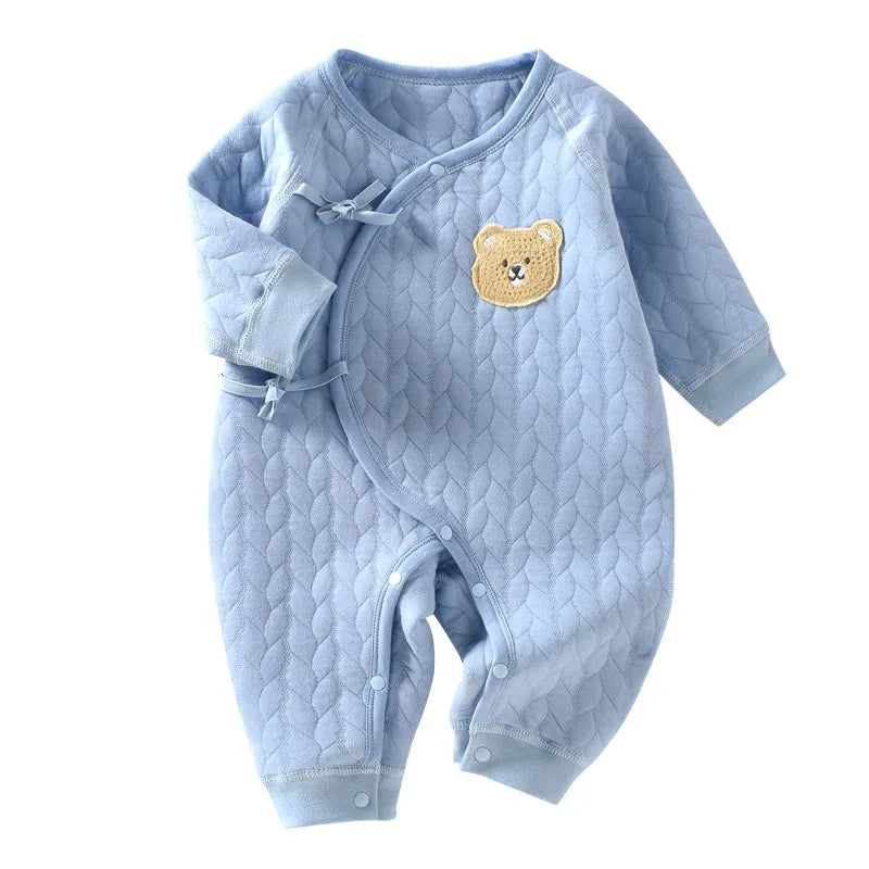 Light blue quilted cotton warm baby romper with bear patch and snap closures for infants