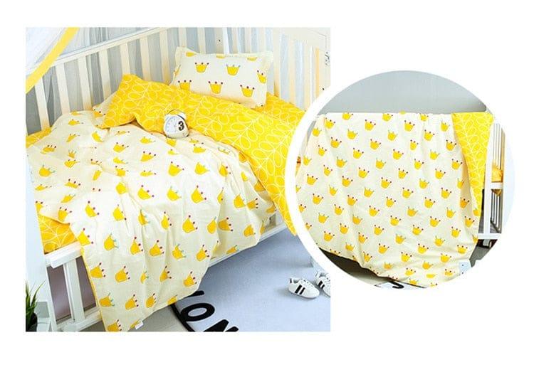 Yellow and white baby bedding sets with crown prints for nursery crib, suitable for infants