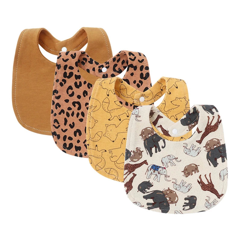 Set of four baby bib and burp cloth set in brown, leopard print, yellow with animals, and white with forest animals for infants